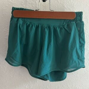 Green Lululemon workout shorts